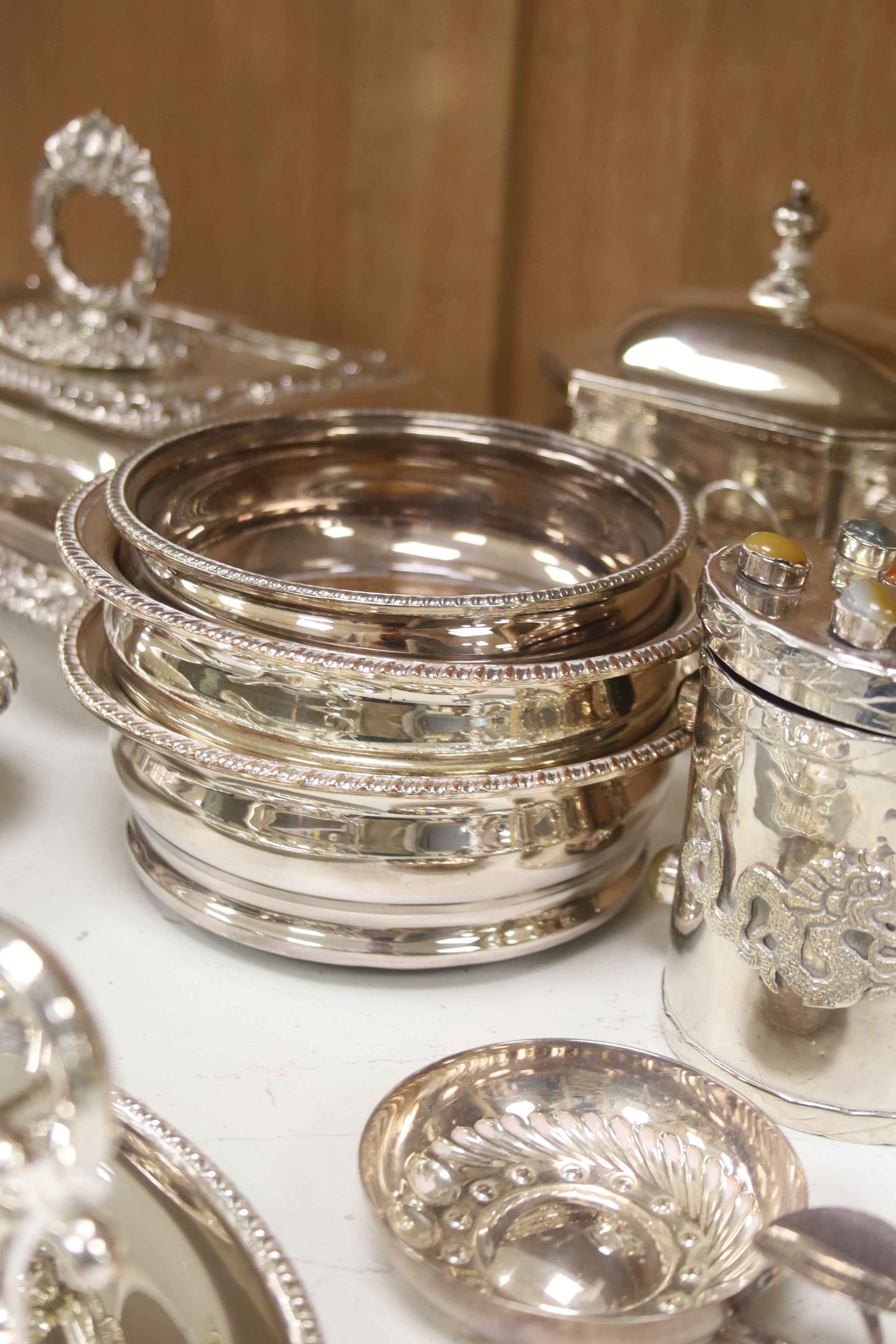 Various plated items, including a pair of rectangular entrée dishes and cover